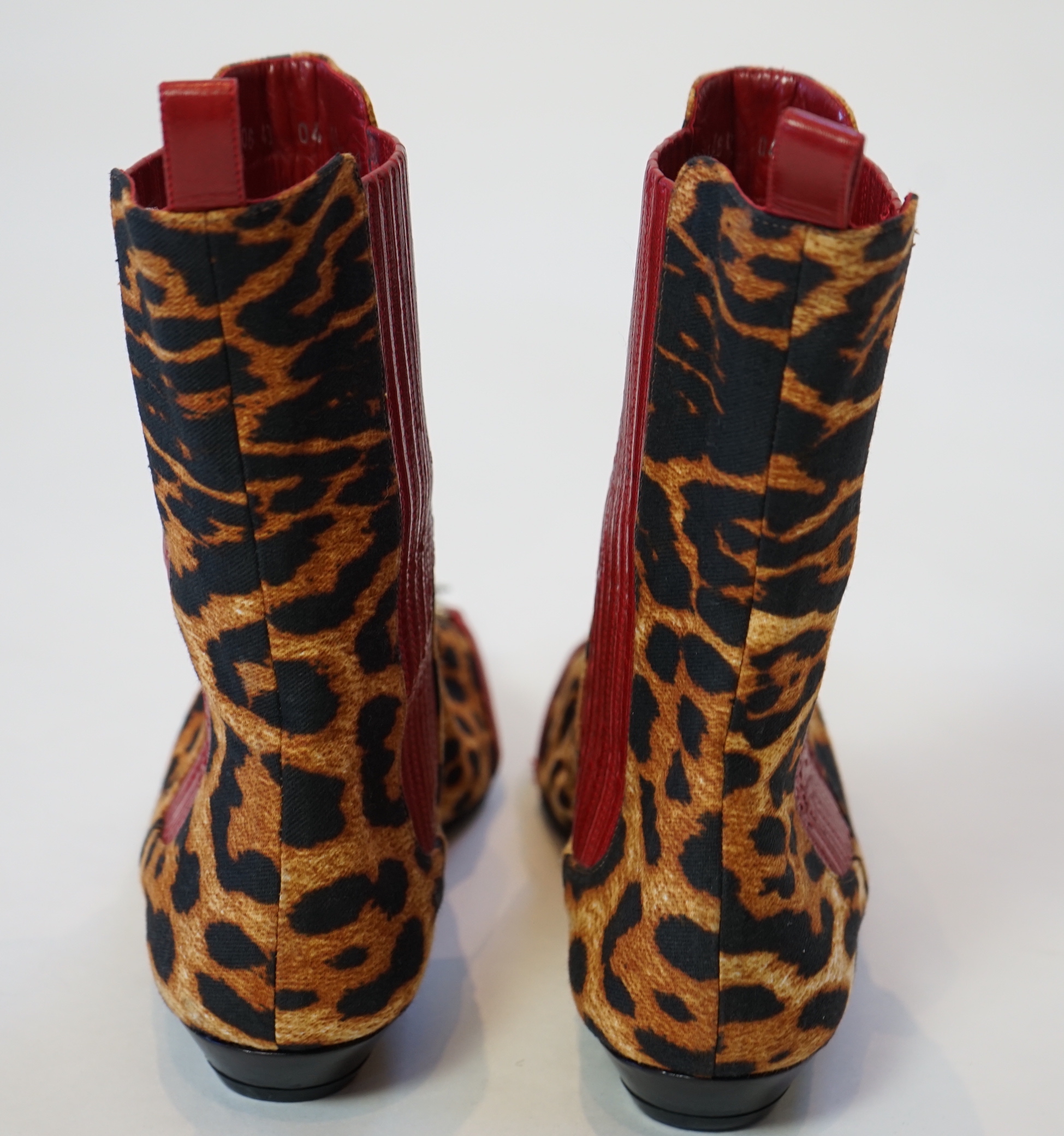 A pair of Christian Dior, Hardcore Collection, lady's leopard canvas ankle boots, size EU 40